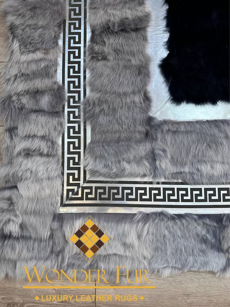 Handmade gray sheepskin office rug with western design and decorative leather border