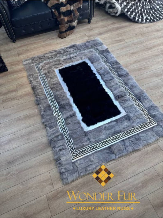 Handmade gray sheepskin office area rug with western design and luxury leather accents on wood floor