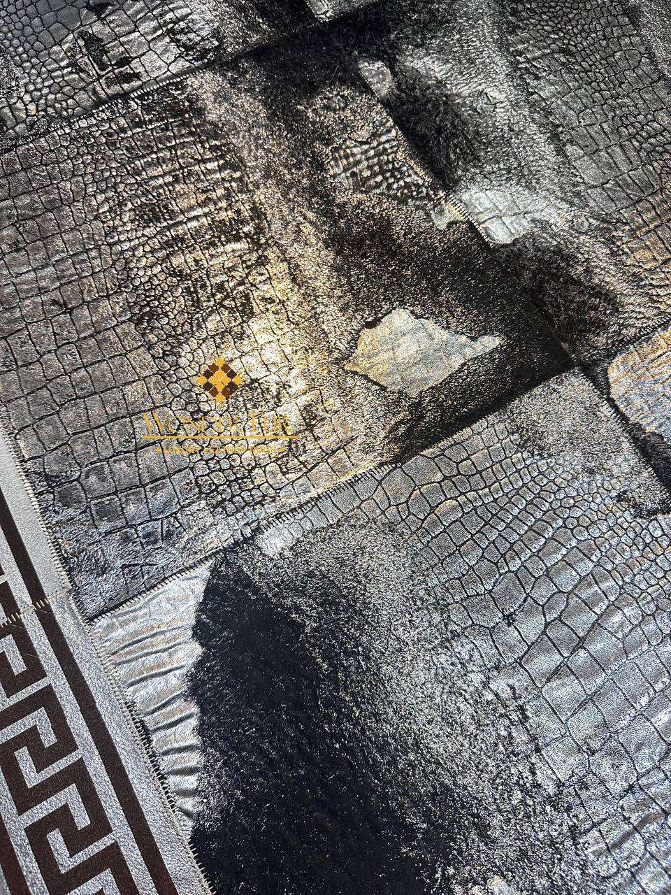 Handmade black and silver two-tone sheepskin rug with soft, durable texture and natural sheen