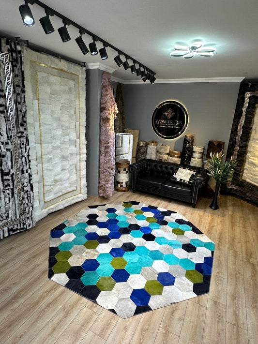 Colorful natural cowhide area rug with hexagonal pattern in a modern living room setting