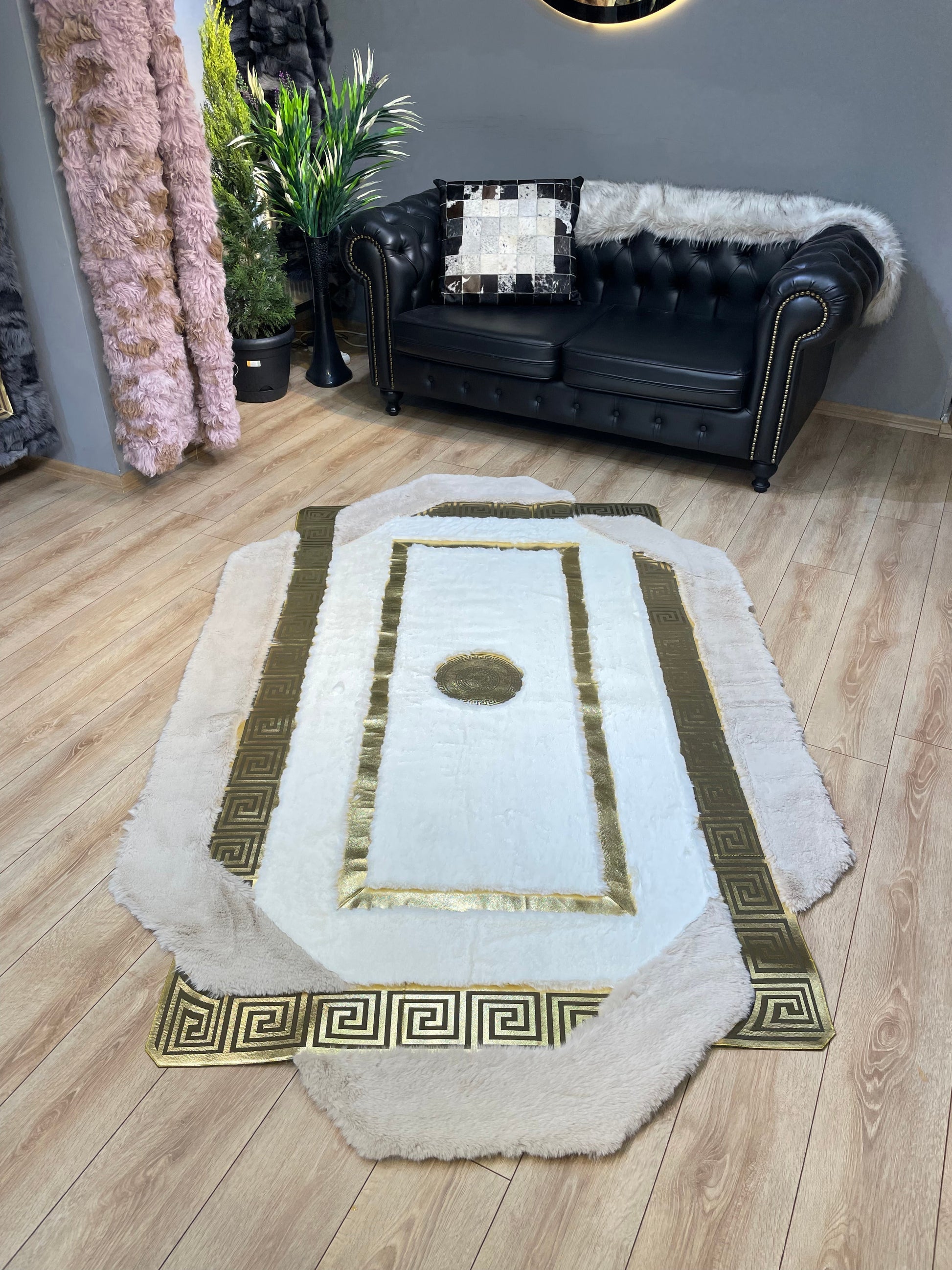 handmade tricolor faux fur area rug with plush modern design and non-slip backing in living room setting