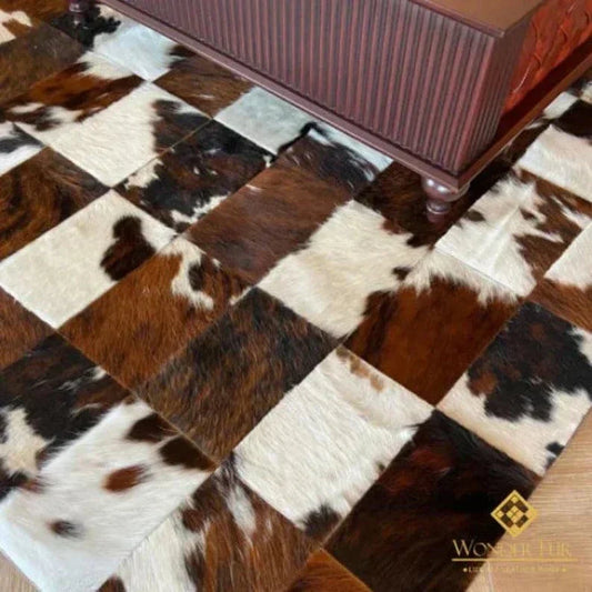 Luxury genuine leather handmade cowhide area rug with non-slip backing and natural fur texture under furniture