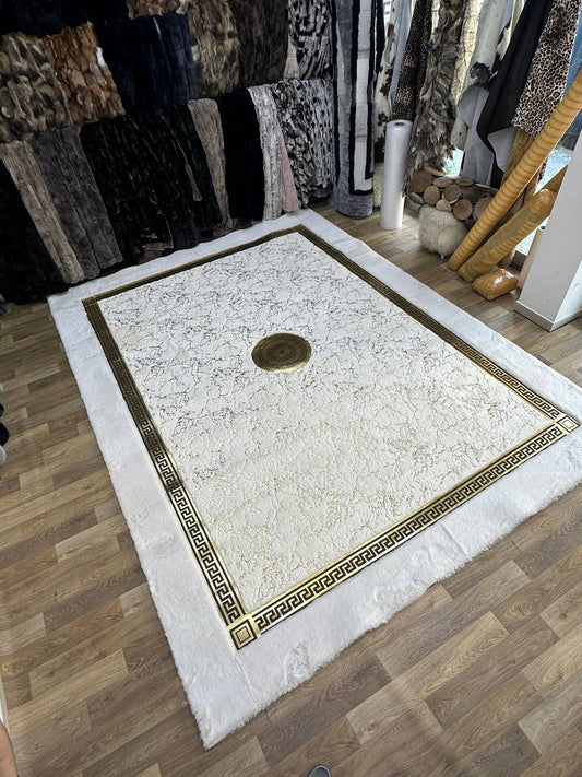 white and gold faux fur round rug with plush texture and elegant design on wooden floor