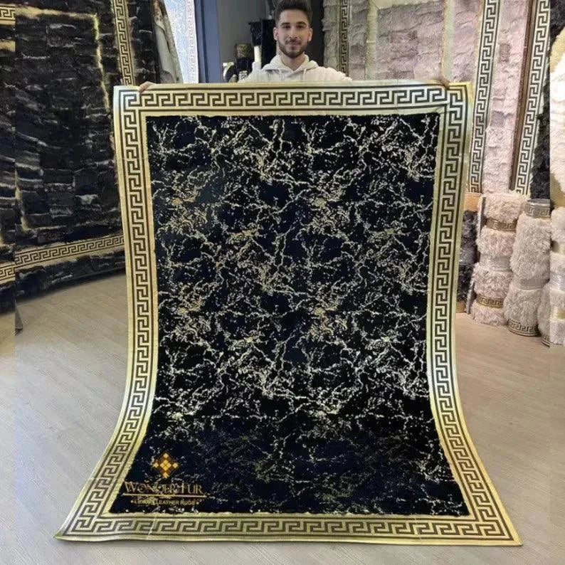 Black gold fluffy plush shaggy rug with Greek key border design displayed by a man in a showroom