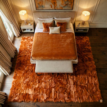 Add warmth and character with this burnt orange handmade sheepskin rug. Custom sizes available for a bold, cozy, high-end interior statement.