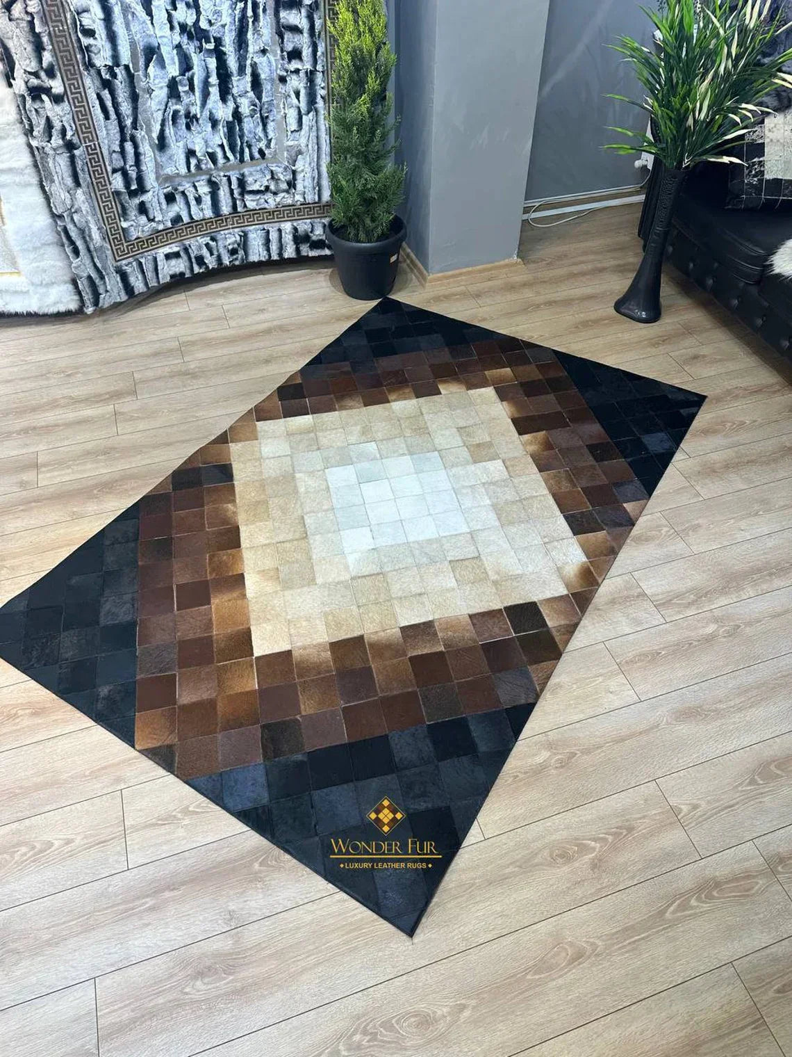 Luxury patchwork tricolor genuine cowhide area rug handmade 6x8 on wooden floor