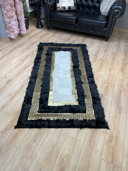 Black white natural sheepskin area rug with gold pattern on wooden floor in living room